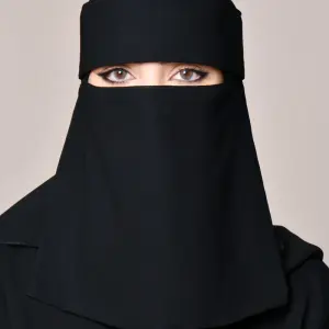 A short niqab with elastic bands and a bow tie