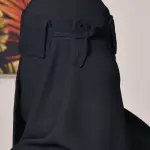 A short niqab with elastic bands and a bow tie