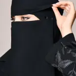A short niqab with elastic bands and a bow tie